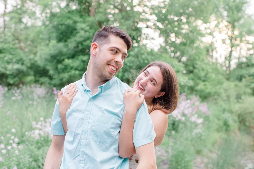 Ideas for what to wear for Engagement Photography, Modern Engagement Session Inspiration Wardrobe Ideas. Unsure of what to wear for your engagement photos, we've got you! Romantic white with Pink Flower dress for Spring Engagement in Ottawa. Grey Loft Studio is Ottawa's Wedding and Engagement Photographer for Real couples, showcasing photos that are modern, bright, and fun.