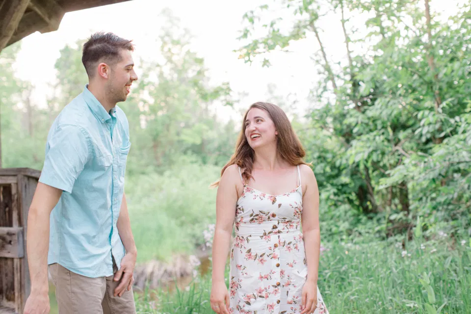 Ideas for what to wear for Engagement Photography, Modern Engagement Session Inspiration Wardrobe Ideas. Unsure of what to wear for your engagement photos, we've got you! Romantic white with Pink Flower dress for Spring Engagement in Ottawa. Grey Loft Studio is Ottawa's Wedding and Engagement Photographer for Real couples, showcasing photos that are modern, bright, and fun.