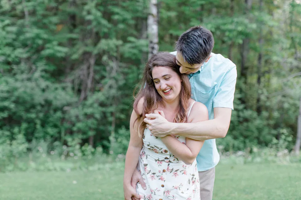 Ideas for what to wear for Engagement Photography, Modern Engagement Session Inspiration Wardrobe Ideas. Unsure of what to wear for your engagement photos, we've got you! Romantic white with Pink Flower dress for Spring Engagement in Ottawa. Grey Loft Studio is Ottawa's Wedding and Engagement Photographer for Real couples, showcasing photos that are modern, bright, and fun.
