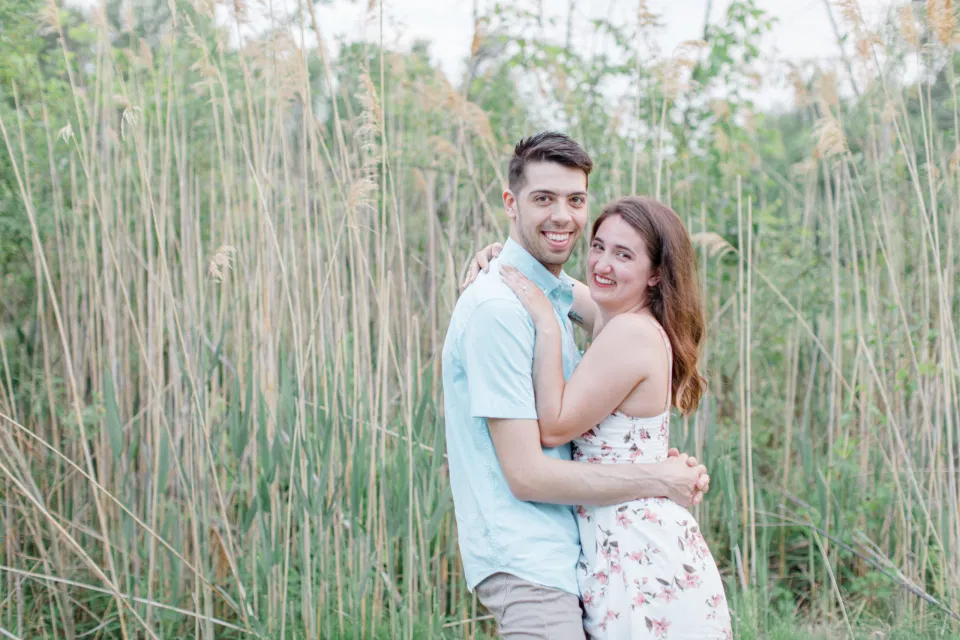 Ideas for what to wear for Engagement Photography, Modern Engagement Session Inspiration Wardrobe Ideas. Unsure of what to wear for your engagement photos, we've got you! Romantic white with Pink Flower dress for Spring Engagement in Ottawa. Grey Loft Studio is Ottawa's Wedding and Engagement Photographer for Real couples, showcasing photos that are modern, bright, and fun.