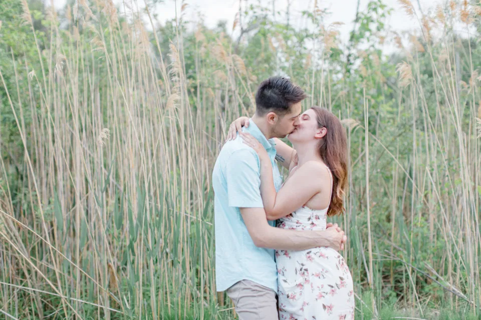 Ideas for what to wear for Engagement Photography, Modern Engagement Session Inspiration Wardrobe Ideas. Unsure of what to wear for your engagement photos, we've got you! Romantic white with Pink Flower dress for Spring Engagement in Ottawa. Grey Loft Studio is Ottawa's Wedding and Engagement Photographer for Real couples, showcasing photos that are modern, bright, and fun.