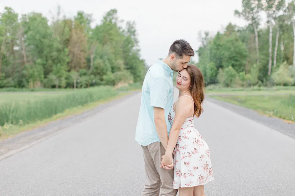 Ideas for what to wear for Engagement Photography, Modern Engagement Session Inspiration Wardrobe Ideas. Unsure of what to wear for your engagement photos, we've got you! Romantic white with Pink Flower dress for Spring Engagement in Ottawa. Grey Loft Studio is Ottawa's Wedding and Engagement Photographer for Real couples, showcasing photos that are modern, bright, and fun.