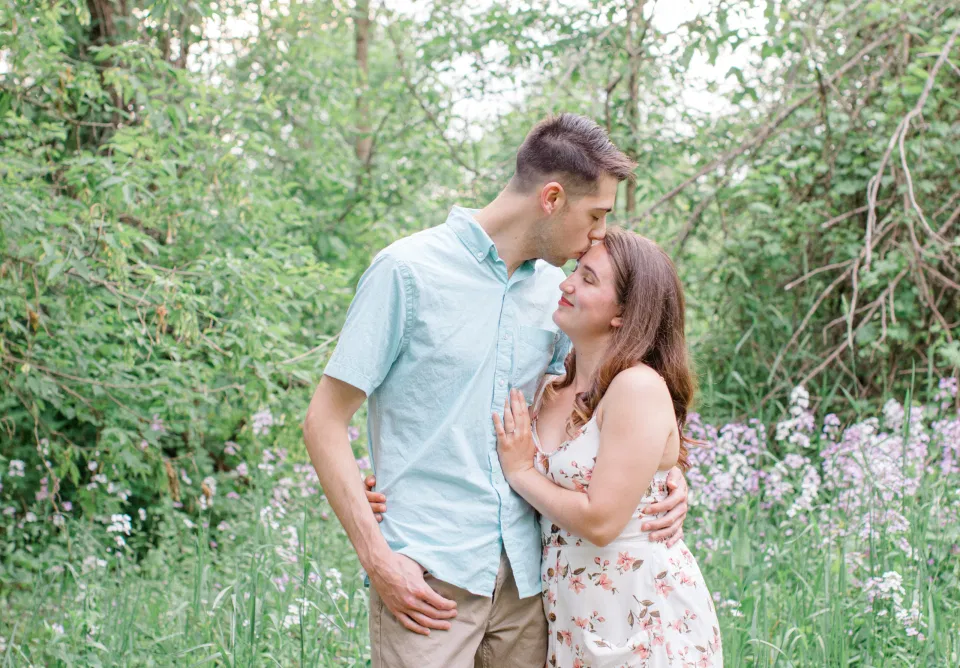 Romantic Poses for Engagement Session - Ideas for what to wear for Engagement Photography, Modern Engagement Session Inspiration Wardrobe Ideas. Unsure of what to wear for your engagement photos, we've got you! Romantic white with Pink Flower dress for Spring Engagement in Ottawa. Grey Loft Studio is Ottawa's Wedding and Engagement Photographer for Real couples, showcasing photos that are modern, bright, and fun.