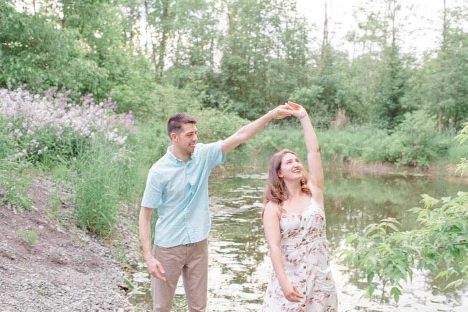 Ideas for what to wear for Engagement Photography, Modern Engagement Session Inspiration Wardrobe Ideas. Unsure of what to wear for your engagement photos, we've got you! Romantic white with Pink Flower dress for Spring Engagement in Ottawa. Grey Loft Studio is Ottawa's Wedding and Engagement Photographer for Real couples, showcasing photos that are modern, bright, and fun.