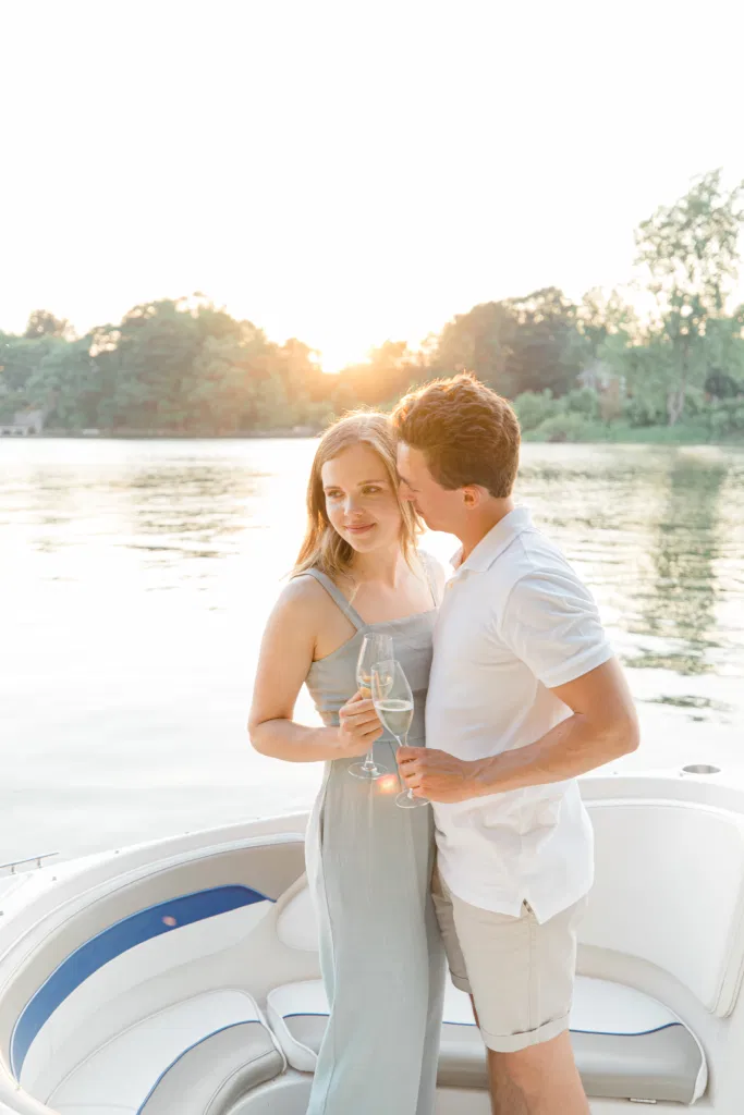 Boat Rides - Ideas for what to wear for Engagement Photography, Modern Engagement Session Inspiration Wardrobe Ideas. Unsure of what to wear for your engagement photos, we've got you! Romantic blue Romper and neutral Shirts and polo. Boat Shoes and Flip Flops. Engagement in Gananoque. Grey Loft Studio is Ottawa's Wedding and Engagement Photographer Videographer for Real couples, showcasing photos that are modern, bright, and fun.