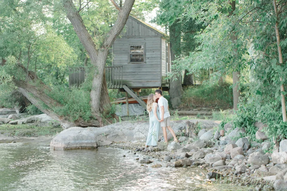 Ideas for what to wear for Engagement Photography, Modern Engagement Session Inspiration Wardrobe Ideas. Unsure of what to wear for your engagement photos, we've got you! Romantic blue Romper and neutral Shirts and polo. Boat Shoes and Flip Flops. Engagement in Gananoque. Grey Loft Studio is Ottawa's Wedding and Engagement Photographer Videographer for Real couples, showcasing photos that are modern, bright, and fun.
