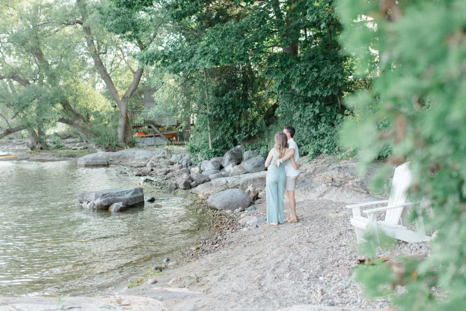 Ideas for what to wear for Engagement Photography, Modern Engagement Session Inspiration Wardrobe Ideas. Unsure of what to wear for your engagement photos, we've got you! Romantic blue Romper and neutral Shirts and polo. Boat Shoes and Flip Flops. Engagement in Gananoque. Grey Loft Studio is Ottawa's Wedding and Engagement Photographer Videographer for Real couples, showcasing photos that are modern, bright, and fun.