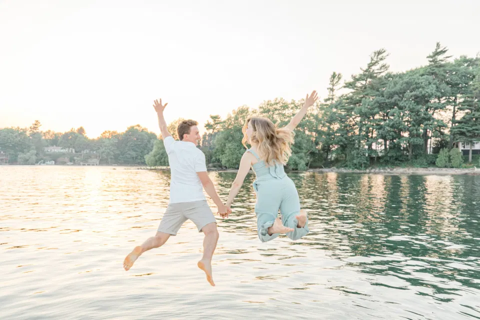 Boat Rides - Ideas for what to wear for Engagement Photography, Modern Engagement Session Inspiration Wardrobe Ideas. Unsure of what to wear for your engagement photos, we've got you! Romantic blue Romper and neutral Shirts and polo. Boat Shoes and Flip Flops. Engagement in Gananoque. Grey Loft Studio is Ottawa's Wedding and Engagement Photographer Videographer for Real couples, showcasing photos that are modern, bright, and fun.