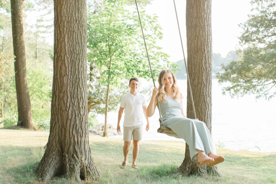 Ideas for what to wear for Engagement Photography, Modern Engagement Session Inspiration Wardrobe Ideas. Unsure of what to wear for your engagement photos, we've got you! Romantic blue Romper and neutral Shirts and polo. Boat Shoes and Flip Flops. Engagement in Gananoque. Grey Loft Studio is Ottawa's Wedding and Engagement Photographer Videographer for Real couples, showcasing photos that are modern, bright, and fun.