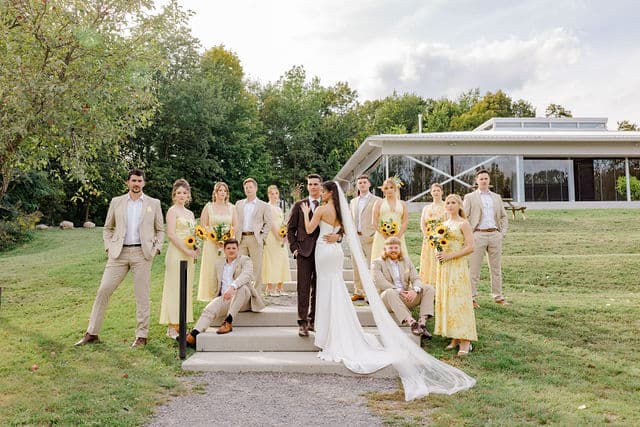 Wedding ceremony among the apple trees at 1818 Farm and Cidery