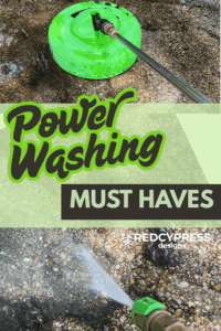 A green pressure washer surface cleaner scrubs a wet patio while a power washer nozzle sprays high-pressure water on a pebble-textured surface. Text overlay reads 'Power Washing Must Haves – Redcypress Designs.'
