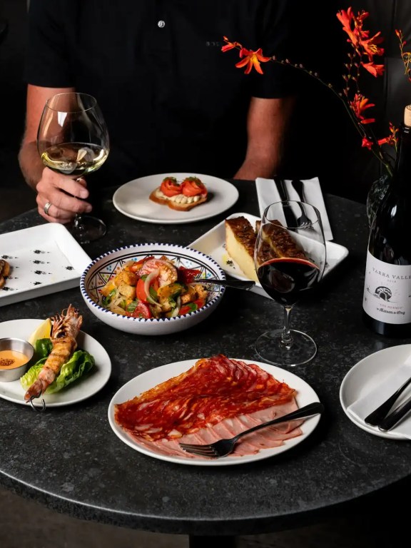 Elegant dinner with wine and gourmet dishes at Jayden Ong photographed by Whitsundays photographer Kairi Kaljo