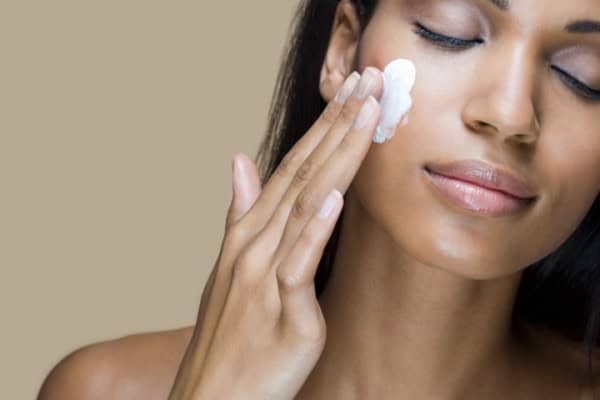 53a0993fc1dee_-_cos-01-woman-applying-face-cream-de