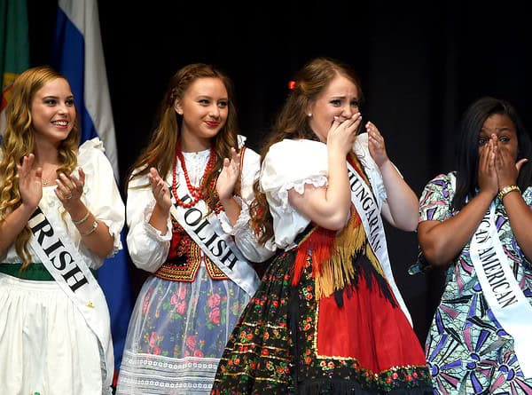 "KRISTIN BAUER | CHRONICLE  The 2015-2016 Lorain International Princess Olivia Harasty, representing the Hungarian culture, reacts when she hears her name called as queen on Thursday night, June 25."