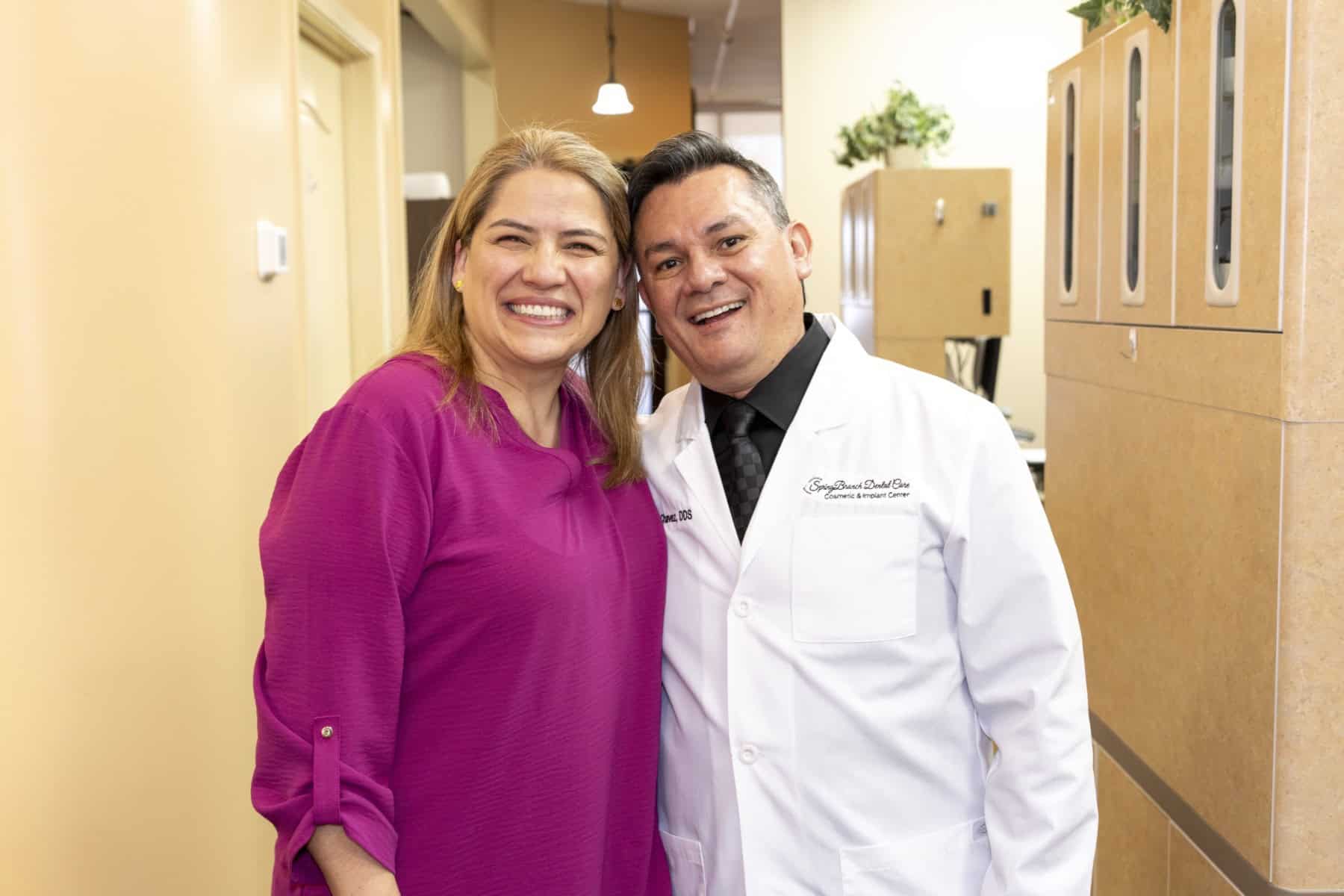 A patient smiling with Dr. Chavez