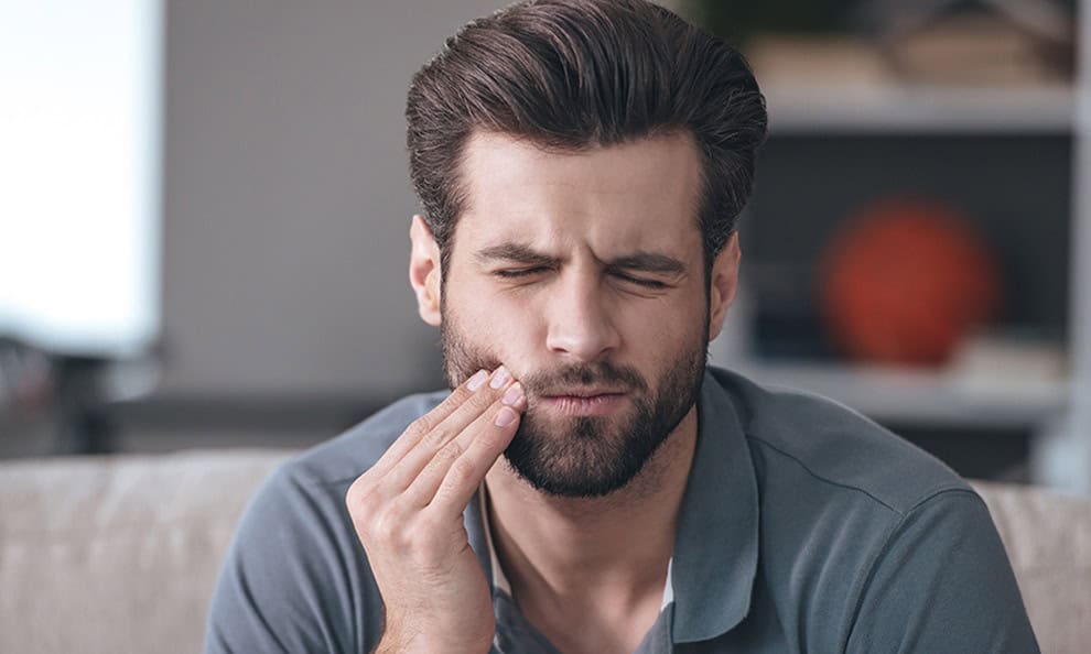 A man with a tooth ache