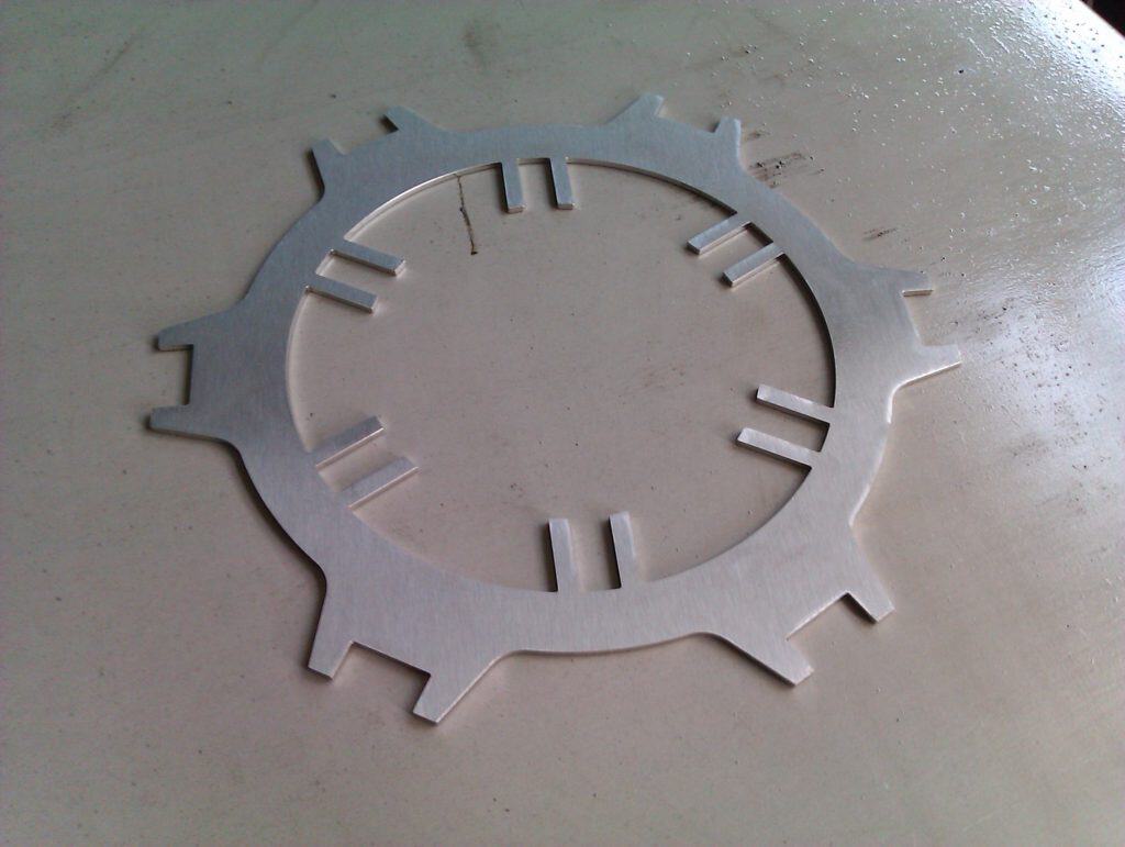 Metal gear component for industrial clock mechanisms.