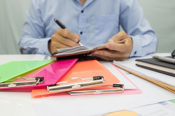 A person creating a portfolio of writing samples