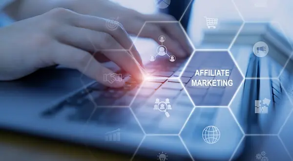 A person researching different affiliate programs to choose the right one for their niche