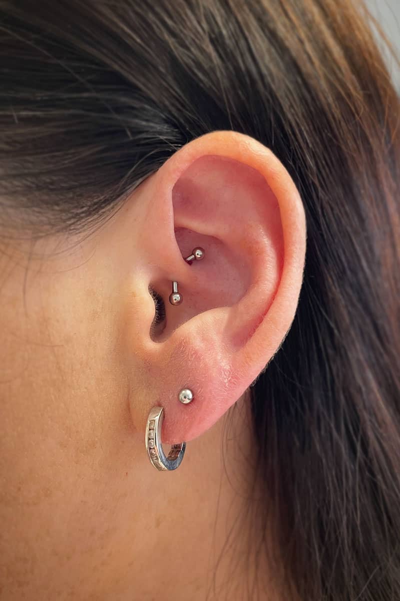 Royal Tattoo| Piercings| Earrings| Body Piercings| Daith piercing and lobe piercings