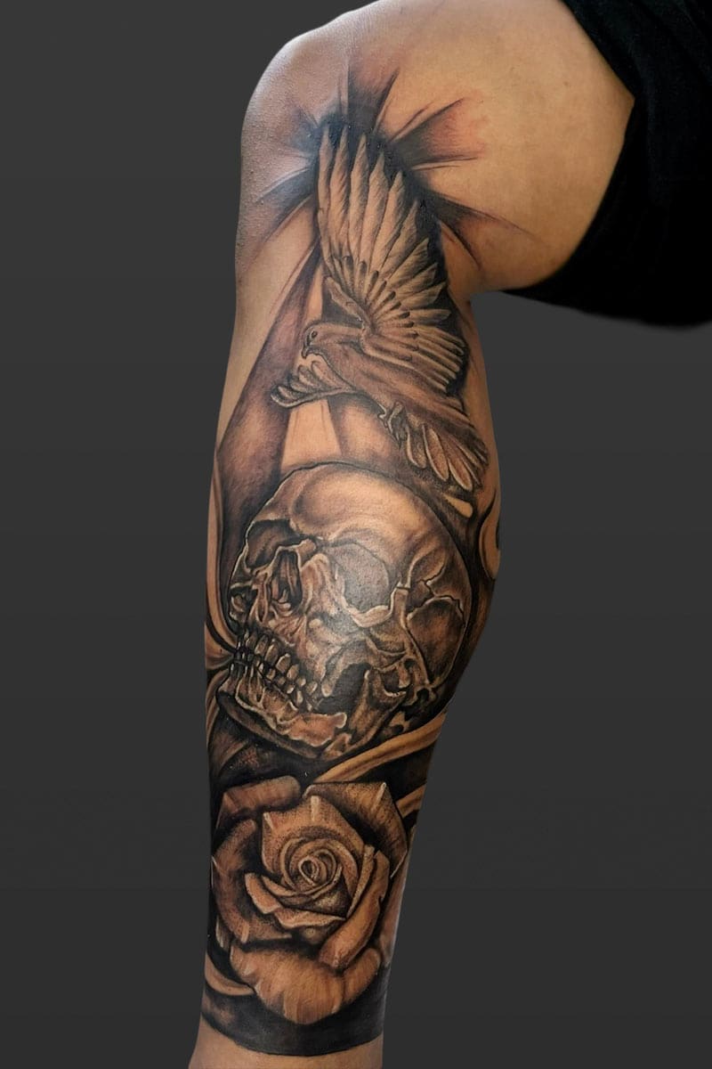 Black and grey realism tattoo skull dove by Ryan
