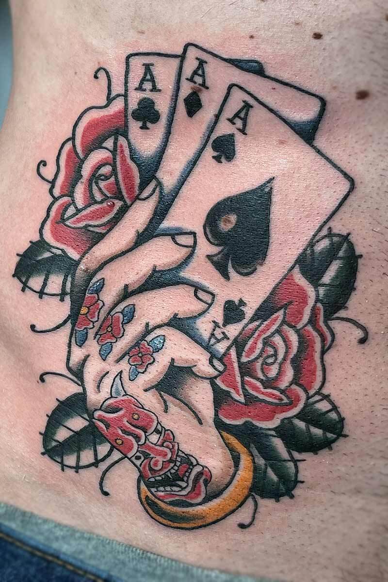 Neotradiitonal tattoo hand cards roses by Cam