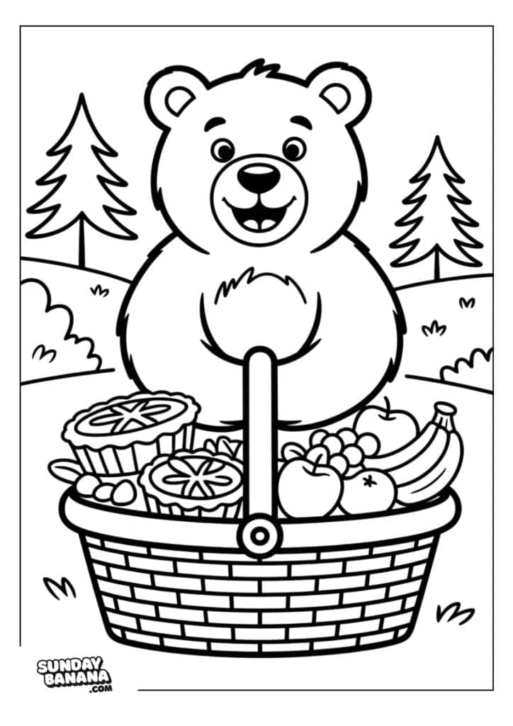 A smiling cartoon bear stands behind a picnic basket filled with fruit, pies, and bananas. The scene is outdoors with trees, grass, and hills in the background. The image is black and white, designed as a coloring page.