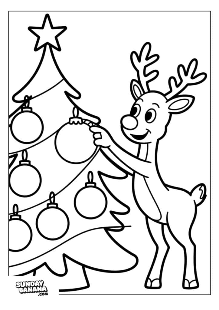 04-christmas-rudolph-coloring-page A cheerful cartoon reindeer stands on its hind legs, smiling as it hangs a round ornament on a Christmas tree decorated with several large baubles. The scene is outlined for coloring, with the SundayBanana.com logo in the bottom left corner.