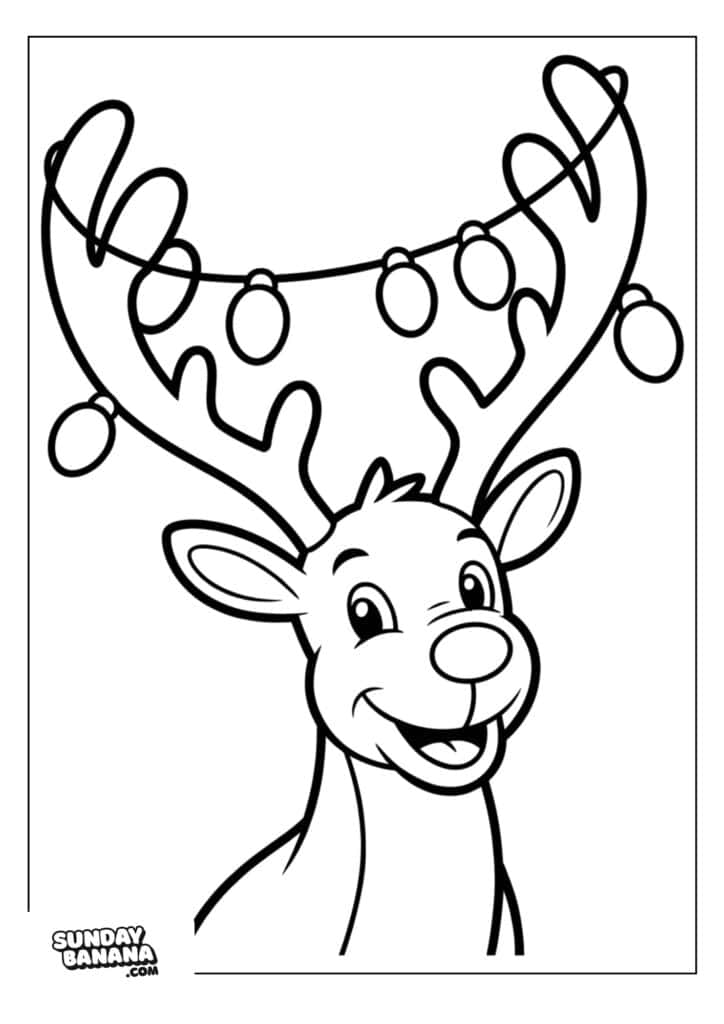 11-christmas-rudolph-coloring-page A cartoon reindeer smiles widely, facing forward. Large antlers decorated with a string of round ornaments or lights curve above its head. The background is plain, and the image has a thick border with a small “SundayBanana.com” logo in the bottom left corner.