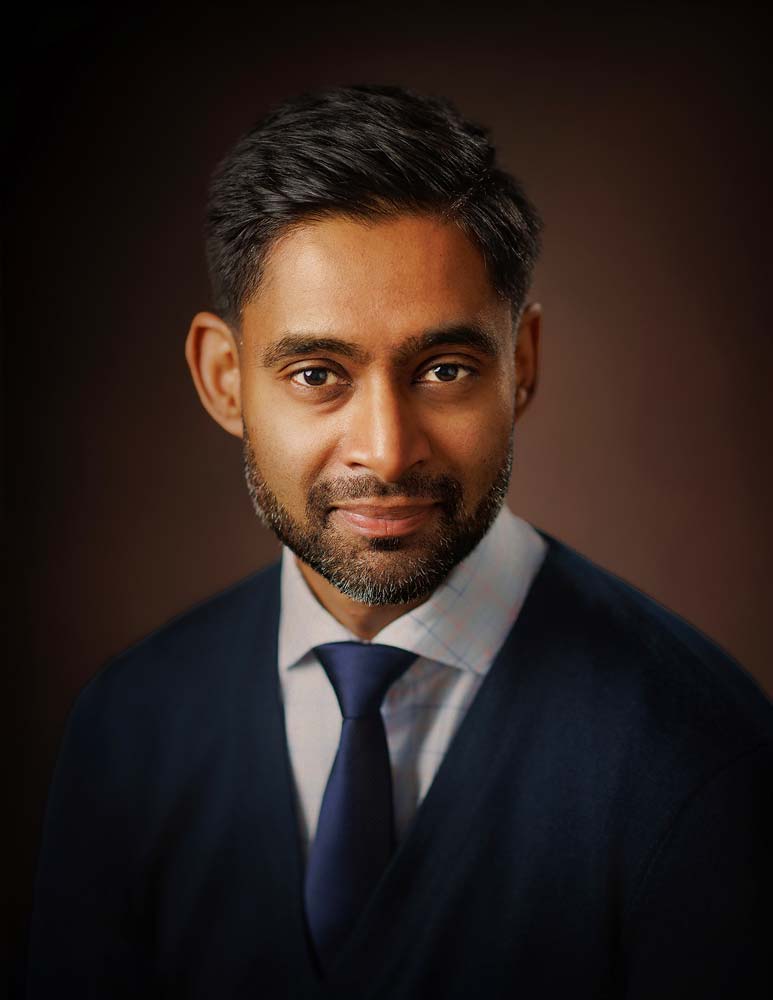 Professional Sussex headshot of a confident businessman highlighting corporate portrait photography services in Sussex.