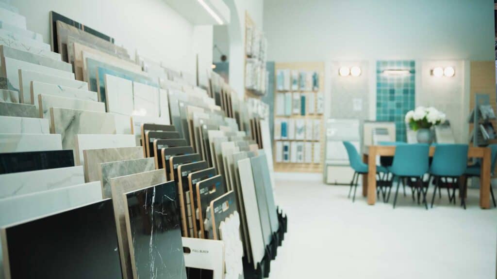 Colorful display of marble and tile samples in a home improvement showroom.