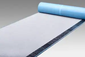 Lightweight building insulation roll with reflective foil backing for energy efficiency.