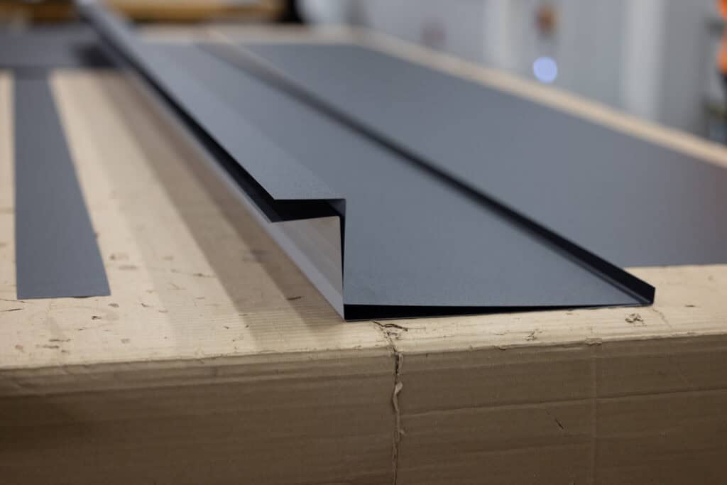 Metal flashing for roofing and siding installation in construction projects.