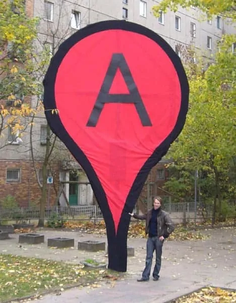 Large red and black "A" marker for office relocation guidance.
