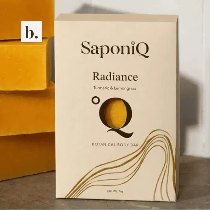 SaponiQ Radiance Turmeric & Lemongrass Botanical Face & Body Bar 2 SaponiQ Radiance turmeric and lemongrass body bar in packaging.
