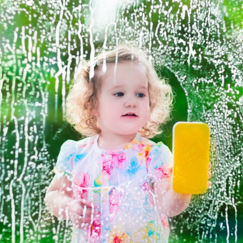 The Inspired Treehouse - Read on to learn how common everyday chores for kids can help boost strength, proprioception, bilateral coordination, midline crossing, fine motor skills, visual skills, and cognitive skills!