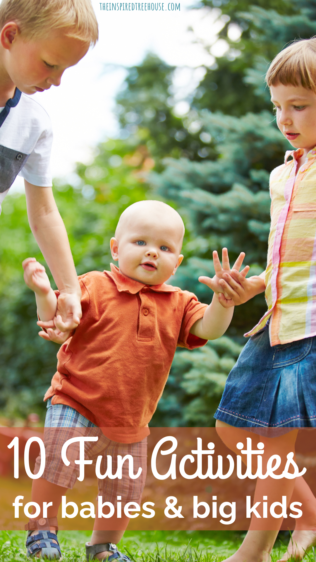 Two big brothers holding hands with baby