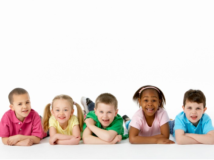 kids lying on the floor side by side