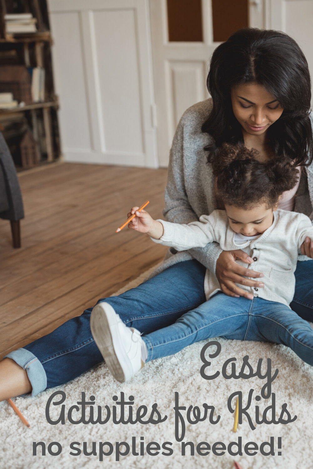 mom and child playing on floor
