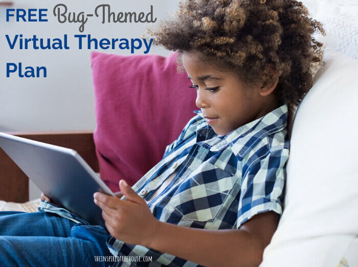 kid sitting on couch looking at tablet
