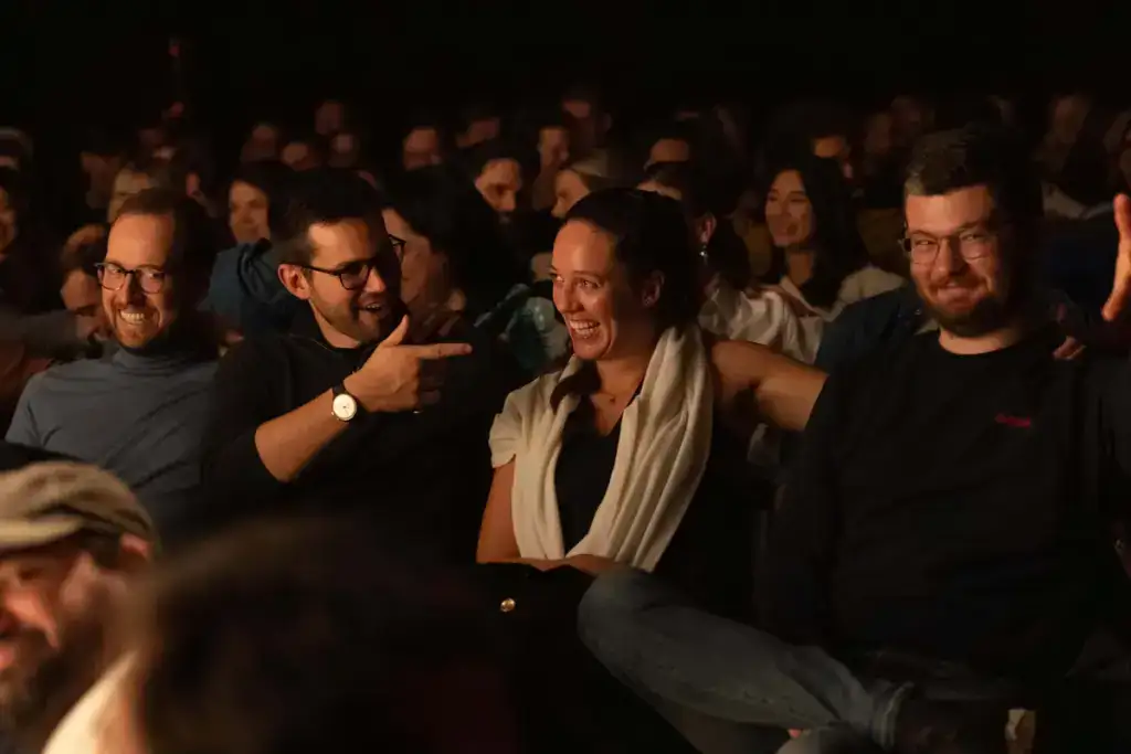 Audience reacting at Jungle Jar problem solving comedy