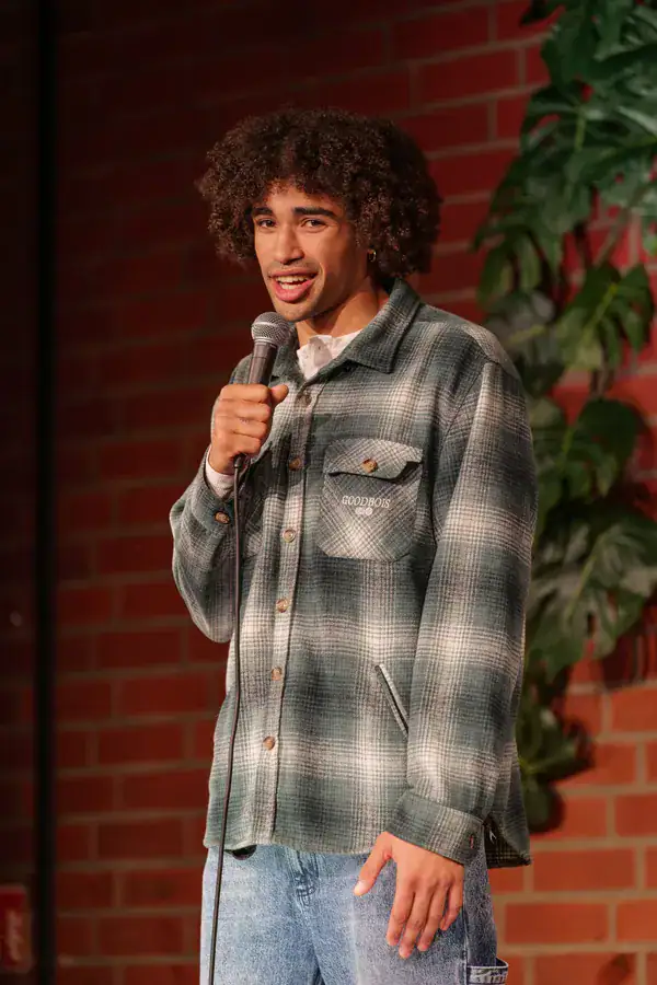 Comedian on stage at Jungle Jar