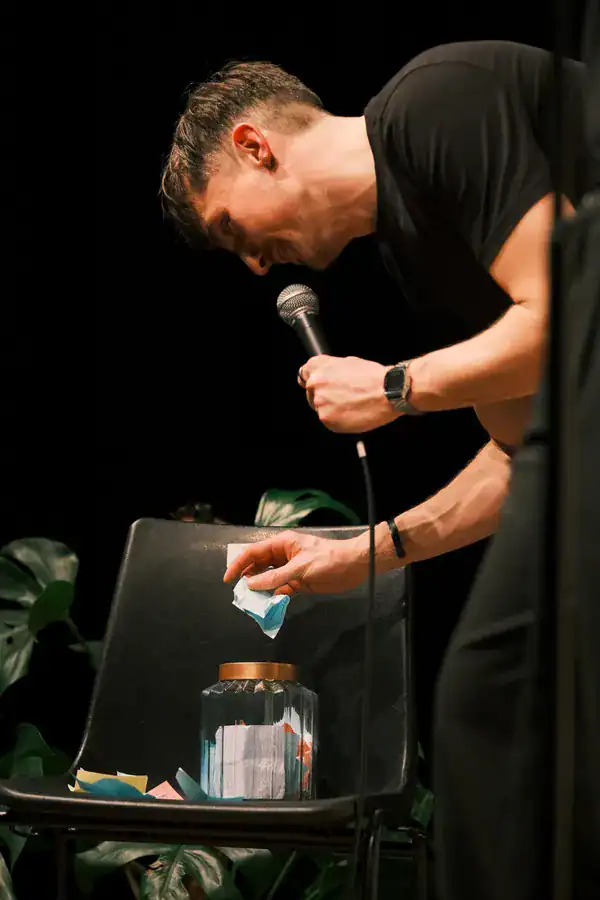 Host pulling an anonymous problem from the jar at Jungle Jar