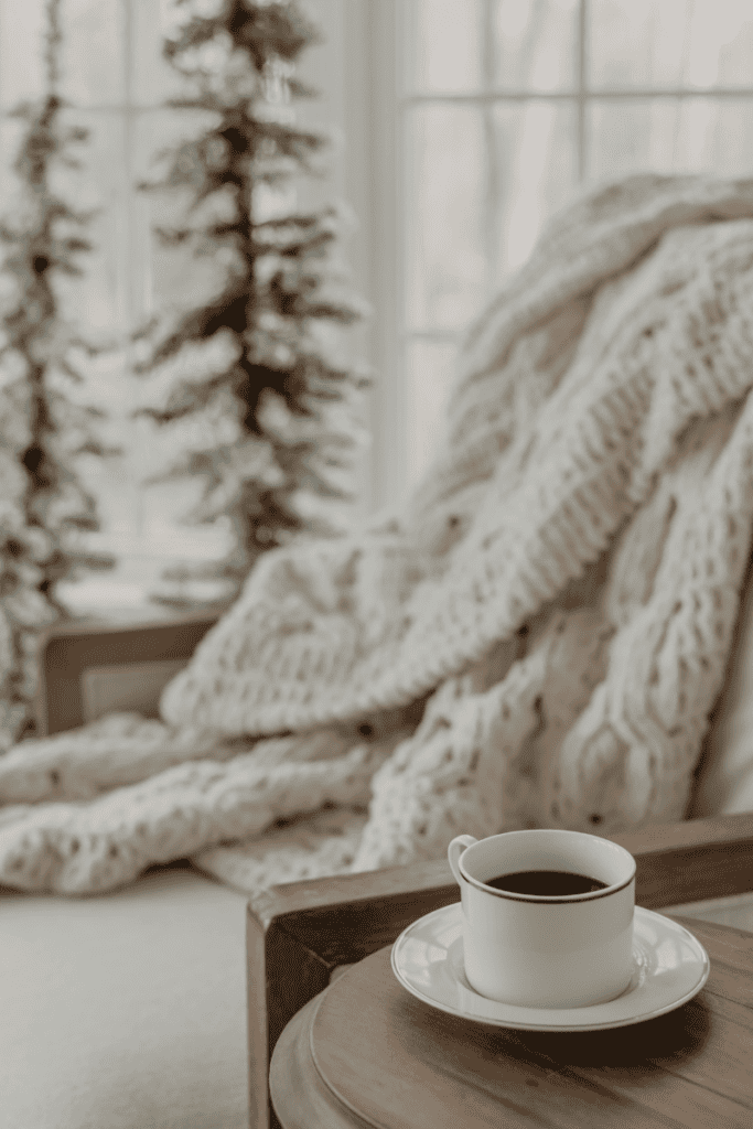 Simple and Fun Winter Bucket List Ideas. Chair with blanket and cup of coffee.