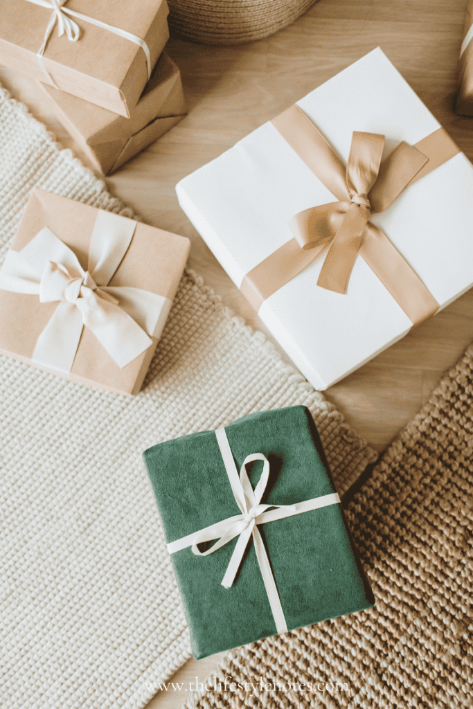 Holiday Gift Ideas for a Healthy New Year. Presents wrapped in white and brown paper and ribbon.