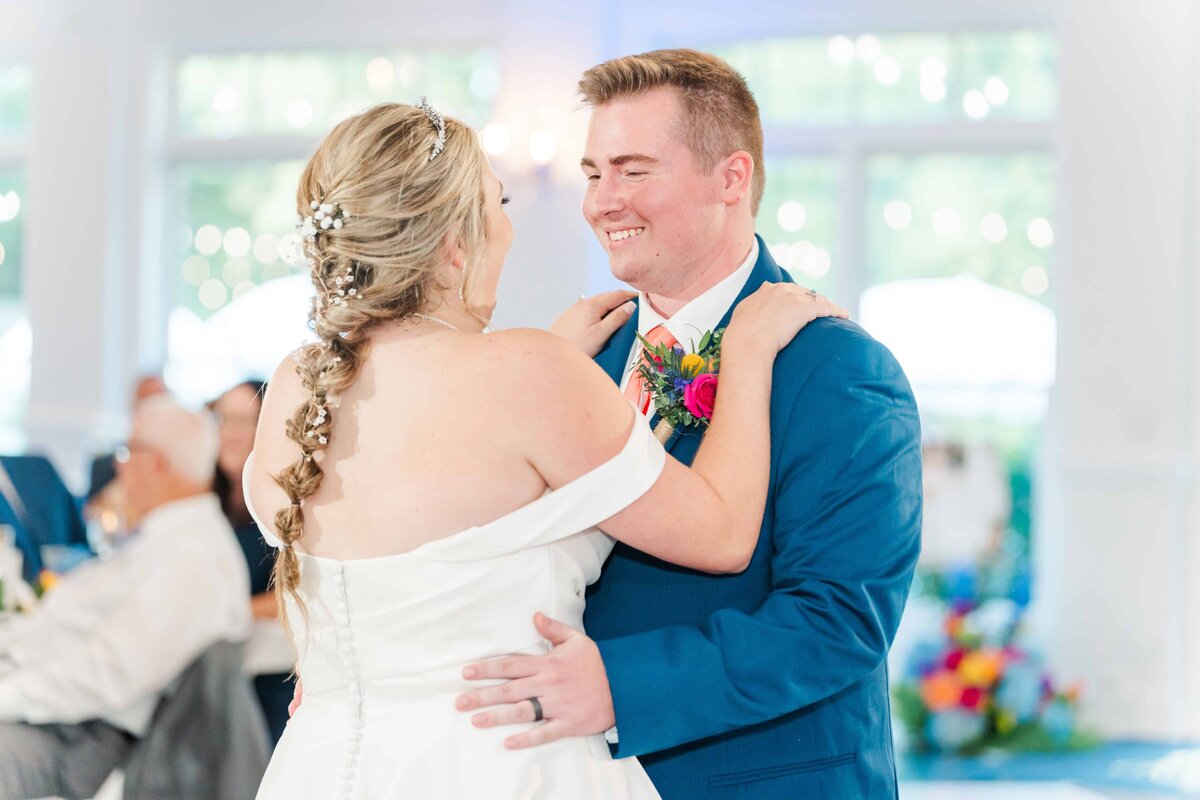 Couple’s first dance inside the formal ballroom at The Grande Victorian wedding celebration