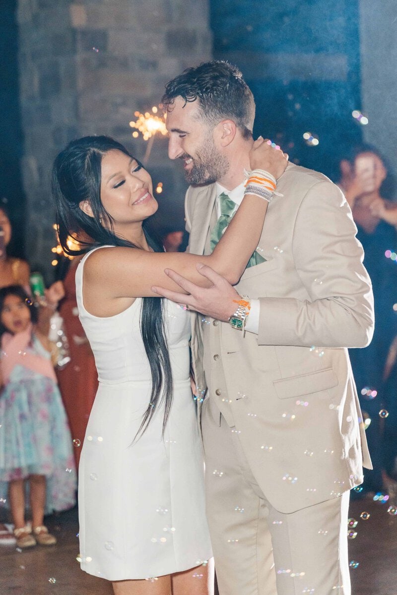 Bride and groom sparkler exit with bubbles at Dugaren Vineyards
