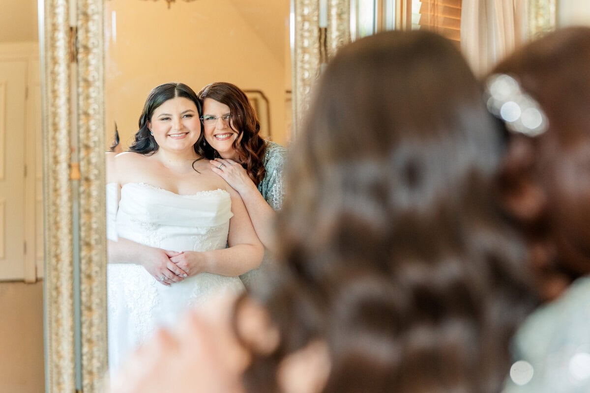 Bride getting ready in Alexander Homestead bridal suite Charlotte NC