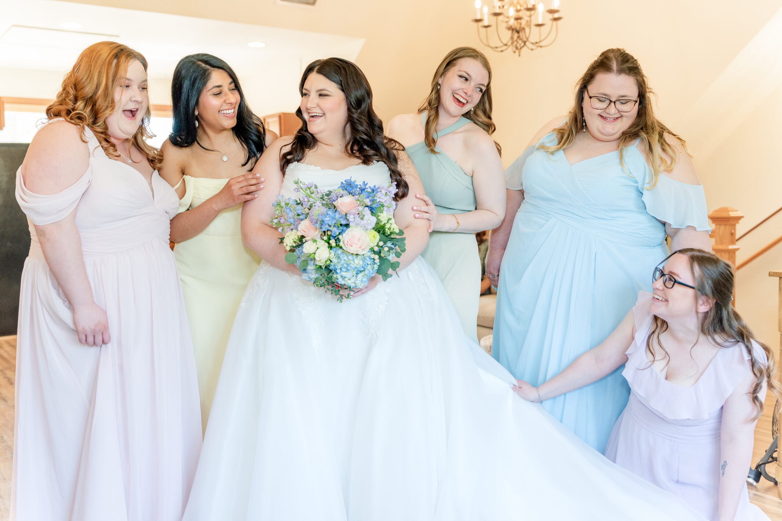 Colorful mismatched bridesmaids in spring wedding at Alexander Homestead Charlotte NC