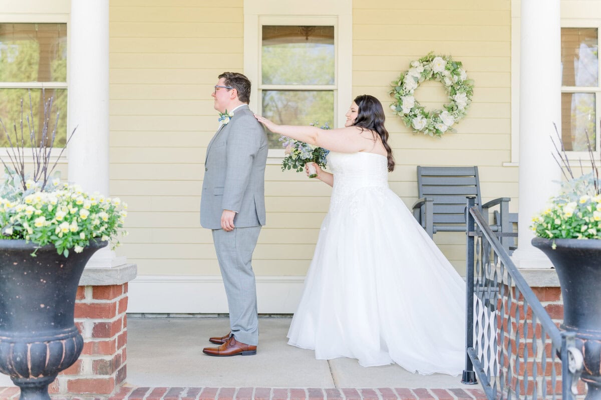 Bride and groom first look at Alexander Homestead botanical gardens